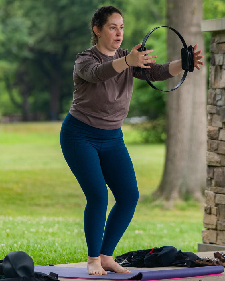 Participant performing standing footwork with ring. Brookdale Park, Bloomfield, NJ.