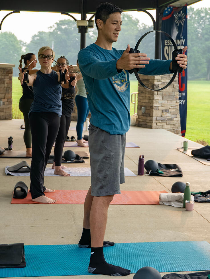 Participants working on rotational mobility using the ring.