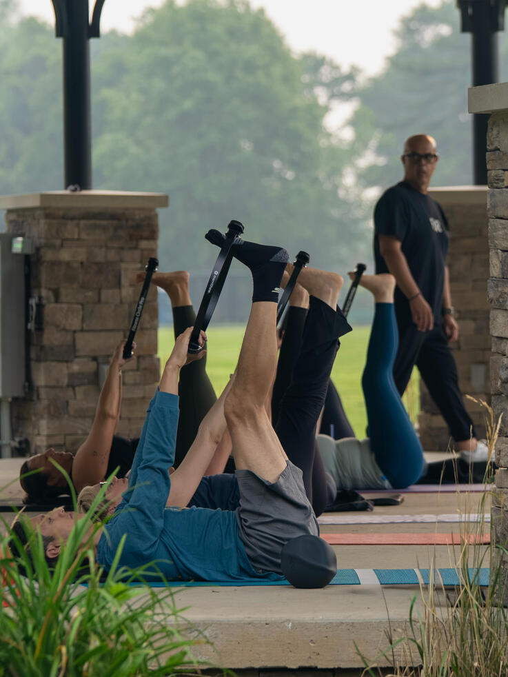 Leg stretches utilizing the ring.