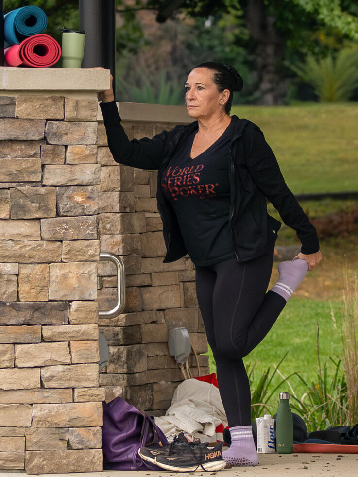 Participant performing a quad stretch.