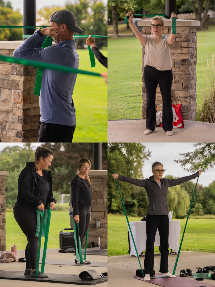 Participants performing band resistance exercises.
